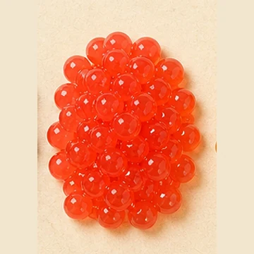 Translucent red strawberry popping boba